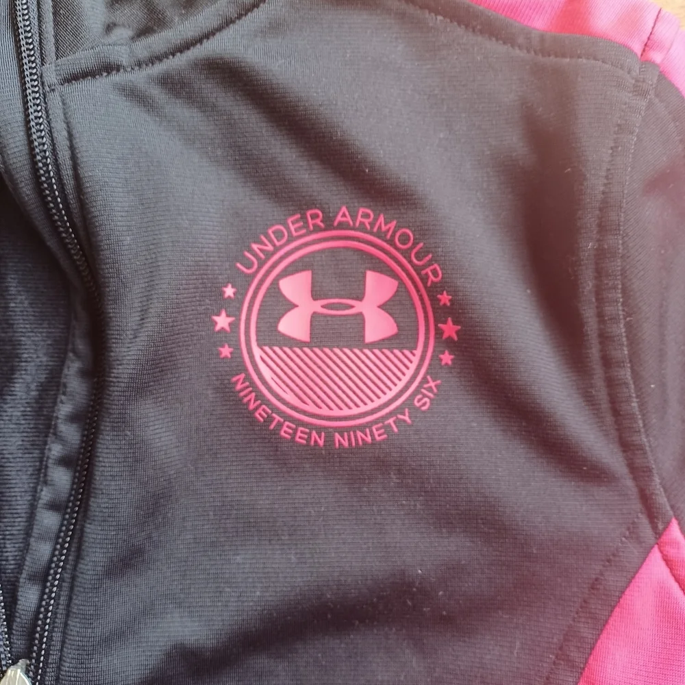 Under Armour youth size large pink and black
